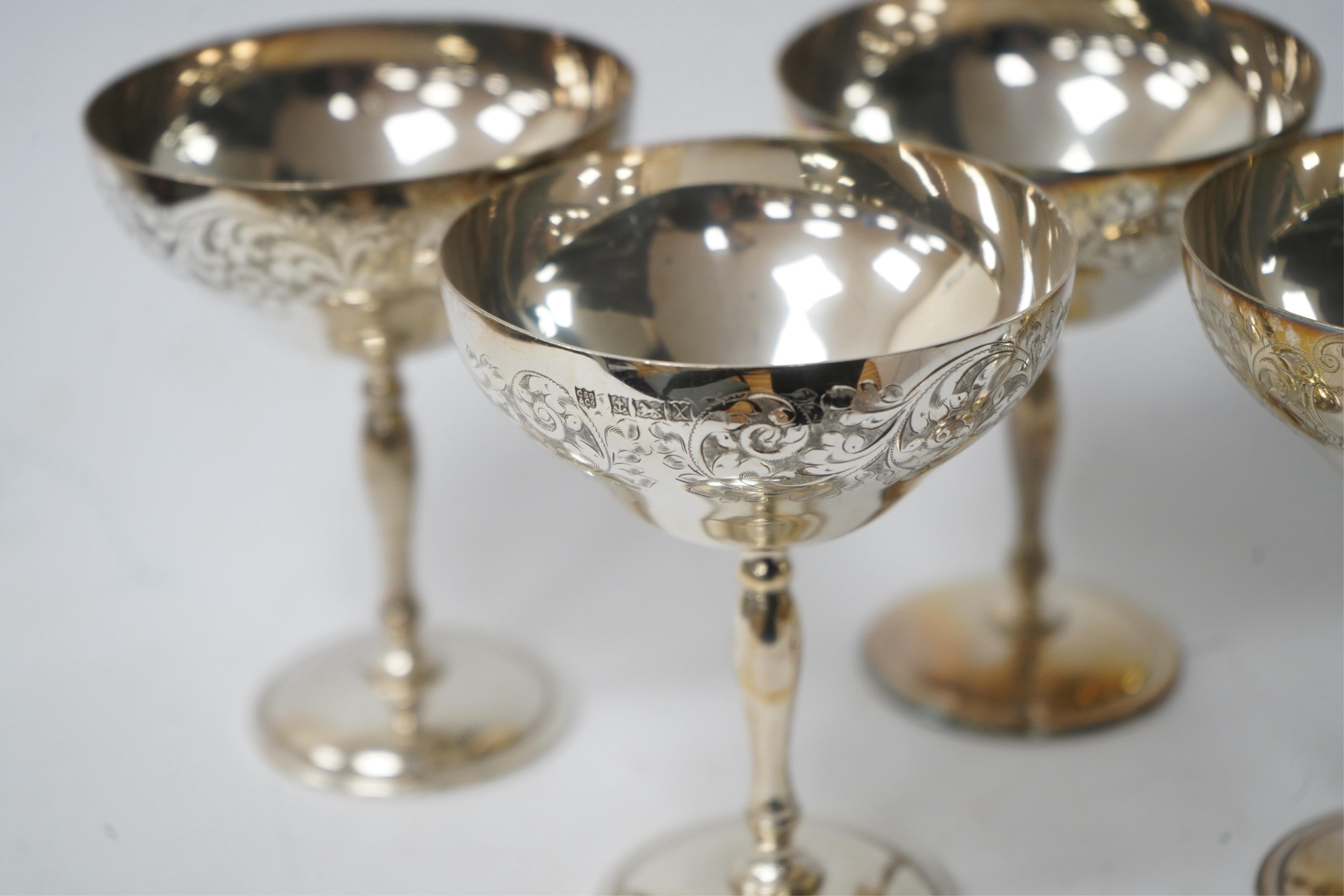 A set of six Elizabeth II engraved silver coupes, by Charles S. Green & Co, Birmingham, 1972, height 11.6cm, 26.3oz. Condition - fair to good